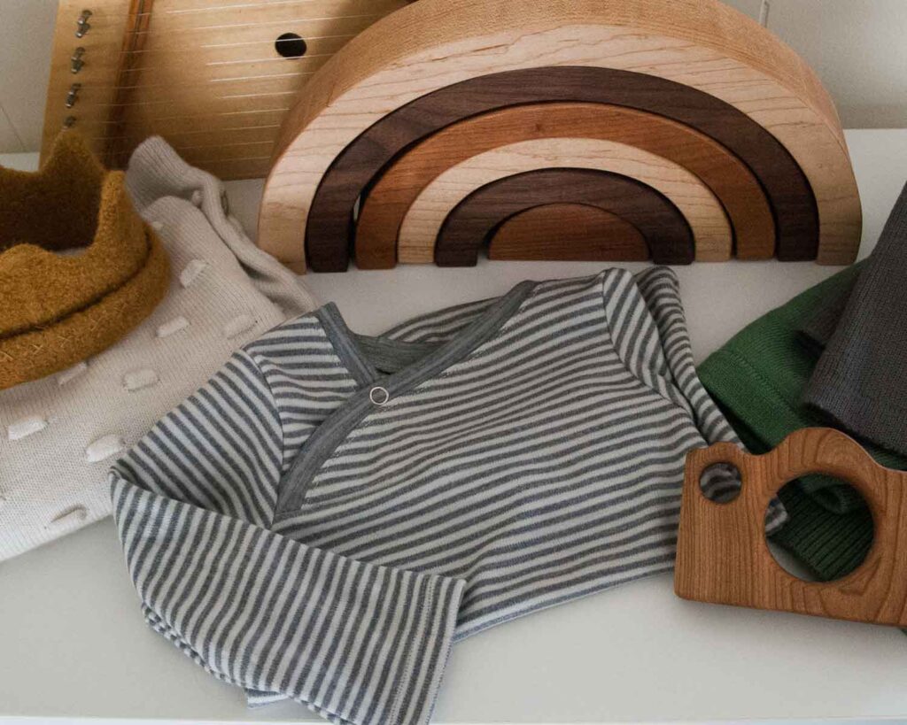 a handmade merino wool shirt folded on a shelf