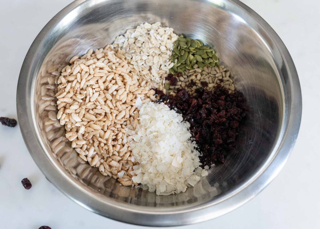 a bowl of ingredients for homemade granola bars