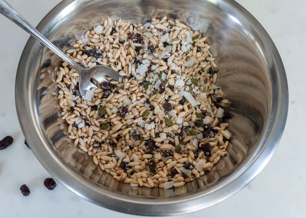 a bowl of ingredients for making homemade granola bars