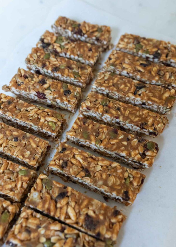 healthy homemade granola bars evenly sliced on a countertop