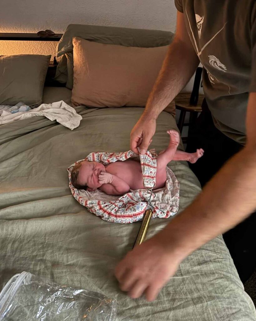 Weighing our newborn