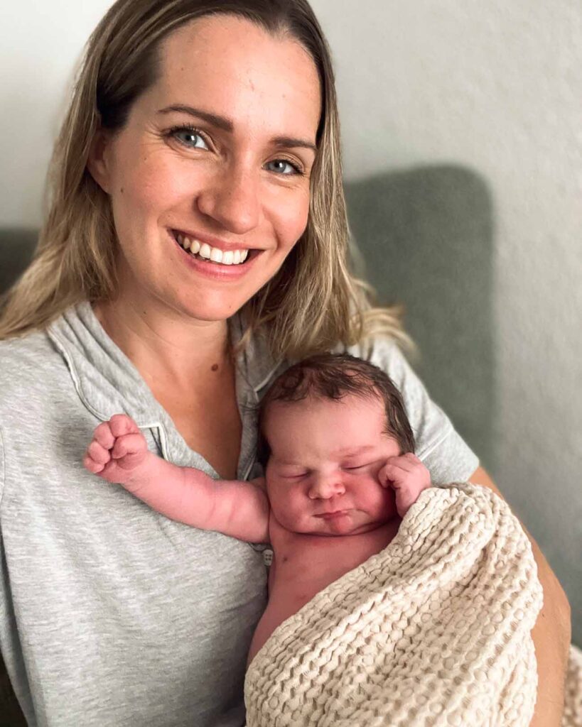 Mama holding newborn baby