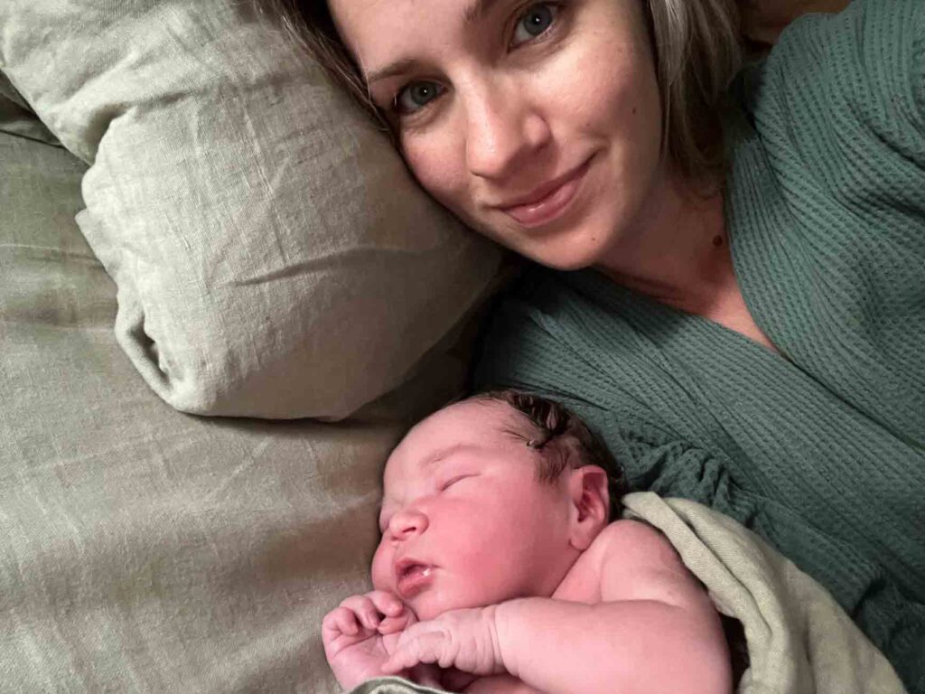 snuggling my baby after my homebirth