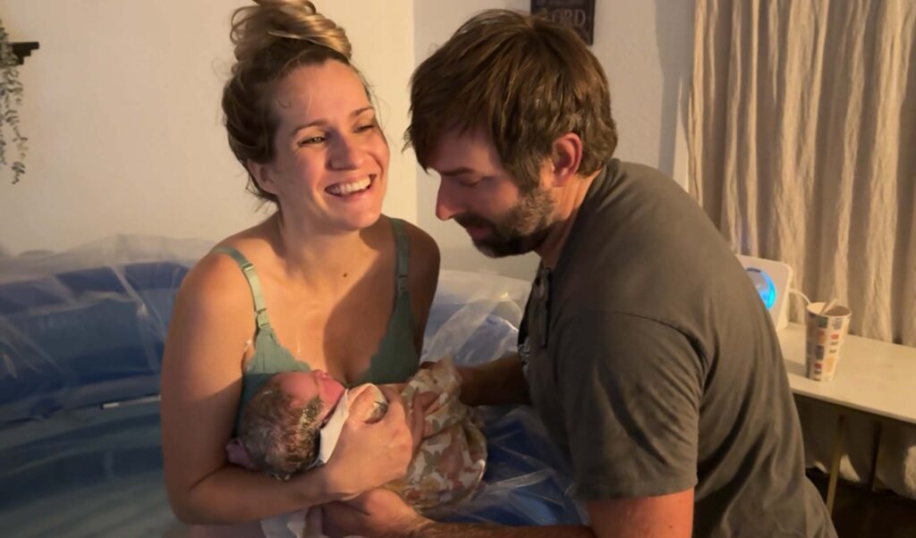 Holding our baby after our homebirth