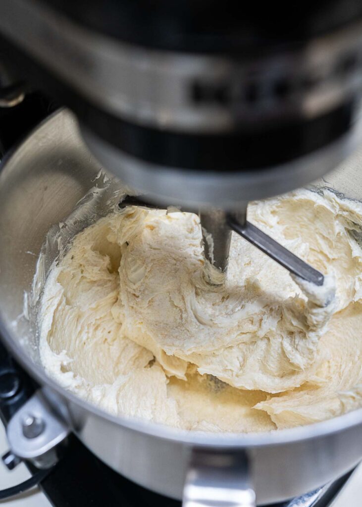 mixing cheesecake batter