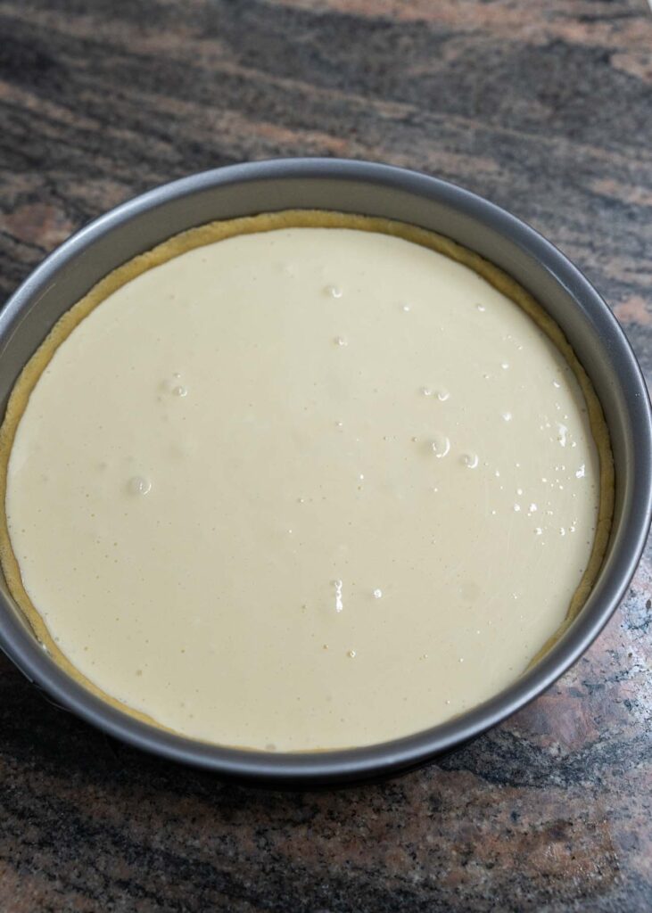 summer berry cheesecake ready to put in the oven
